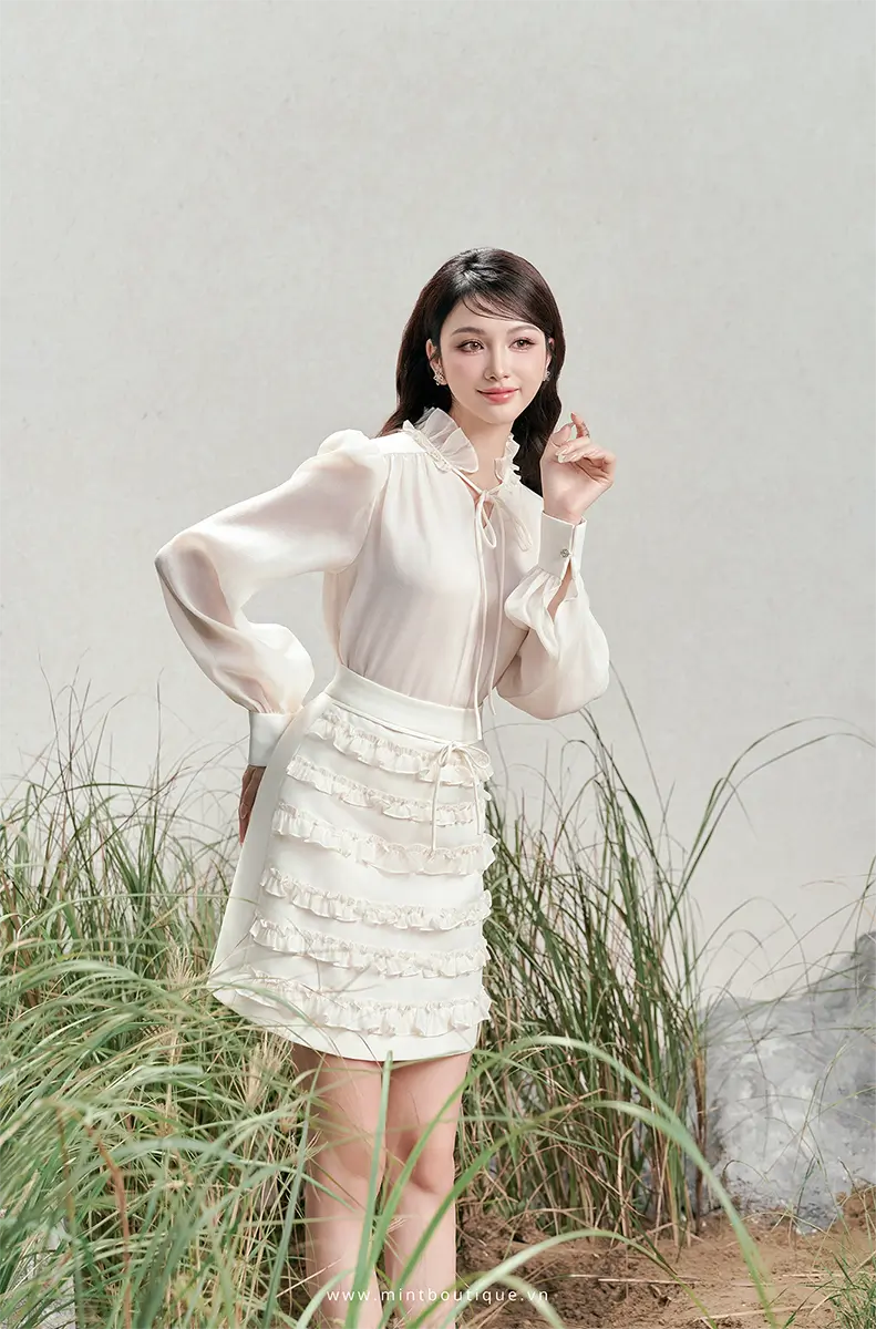 Chân váy A tafta kem kê bèo tầng nơ chỉ kem - Image 2