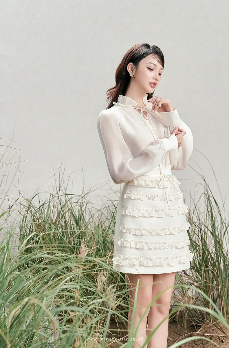Chân váy A tafta kem kê bèo tầng nơ chỉ kem - Image 3