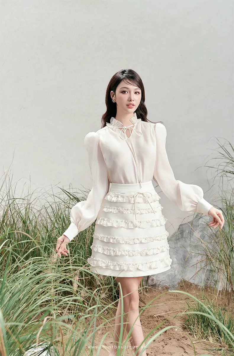 Chân váy A tafta kem kê bèo tầng nơ chỉ kem - Image 4